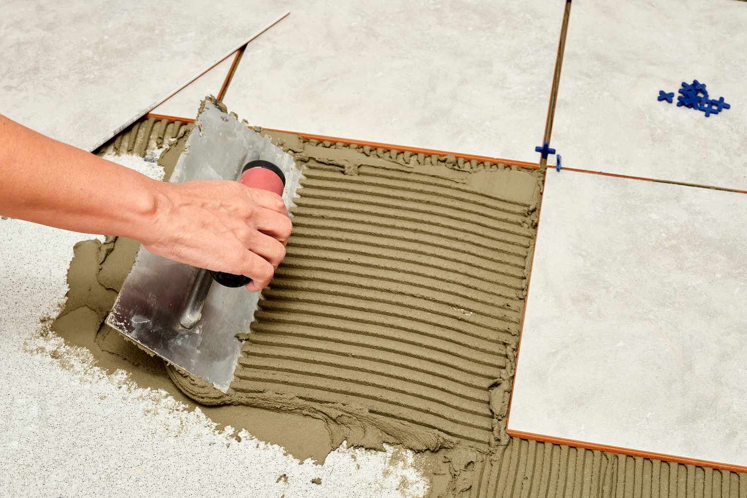 Modern tile backsplash installed in a Toronto kitchen using subway-style tiles.